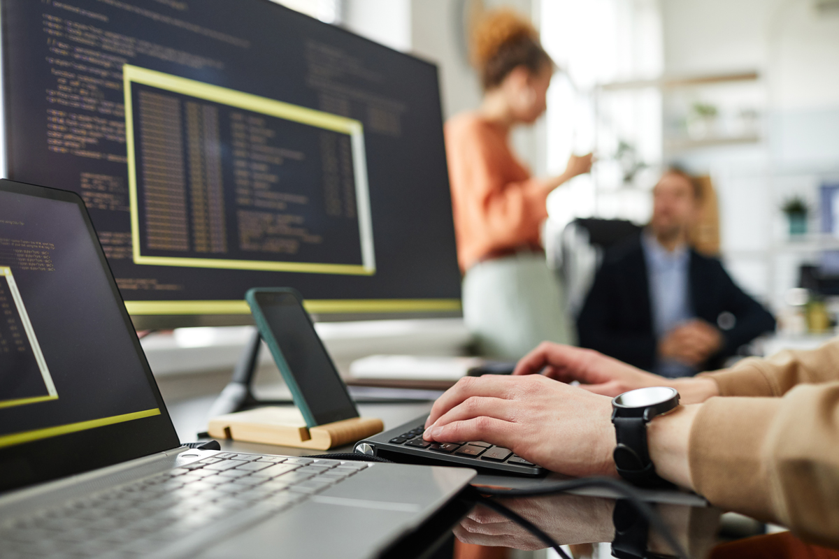 programmer-typing-codes-on-computer